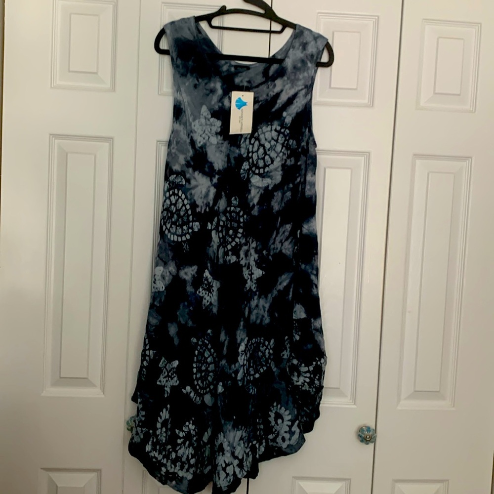 Sea life swim coverup 40 inches at longest has some stretch 100-%rayon